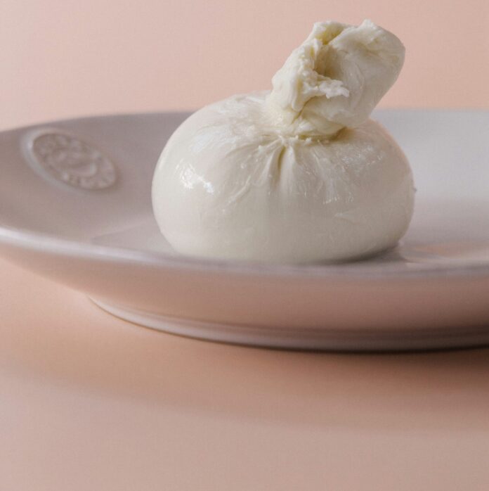 Ball of burrata cheese on a plate