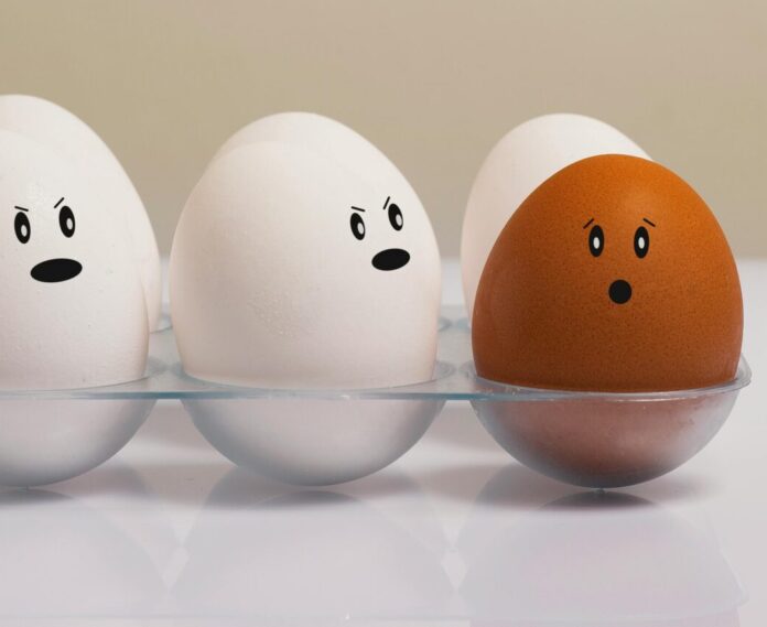 Eggs in Tray on White Surface